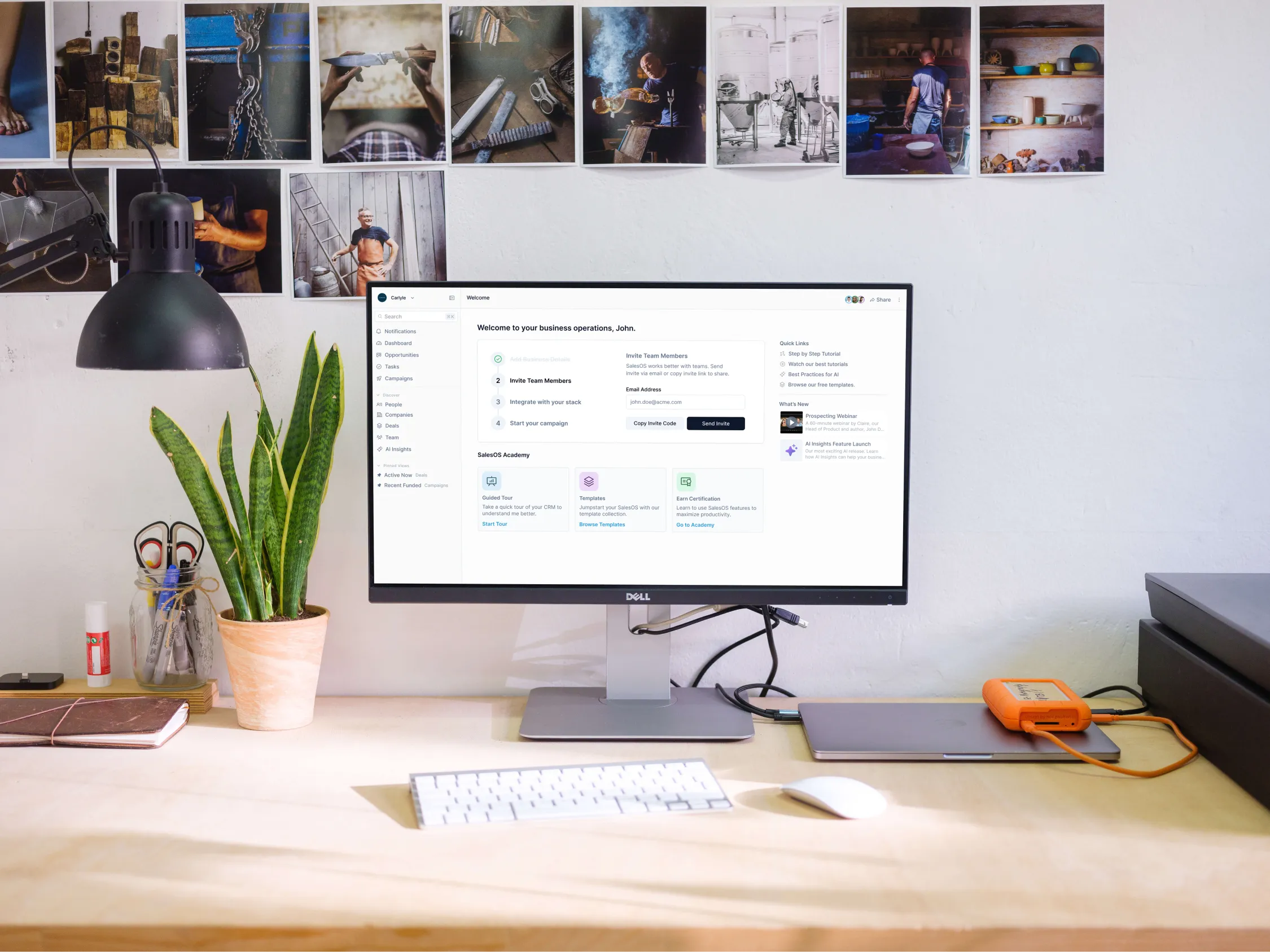 Image of a desk with a B2B SaaS open on the display